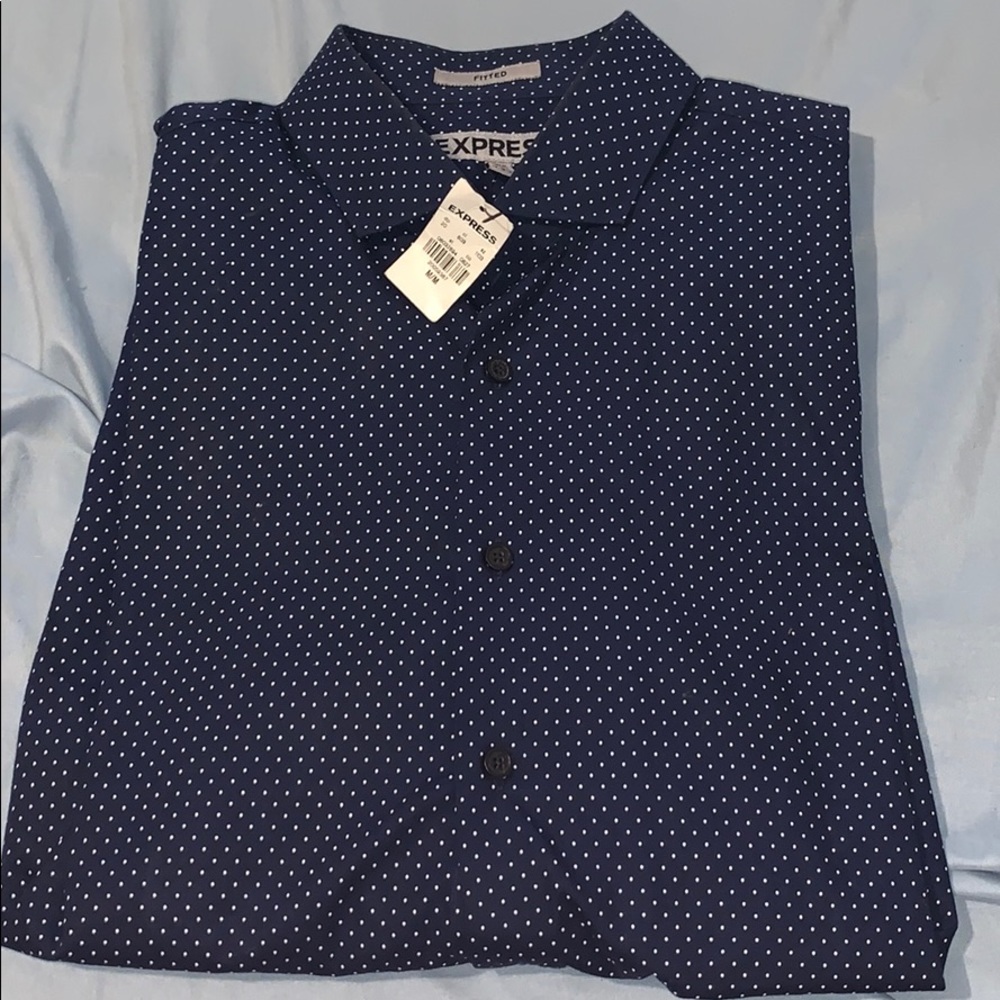 Navy blue and white polkadot shirt